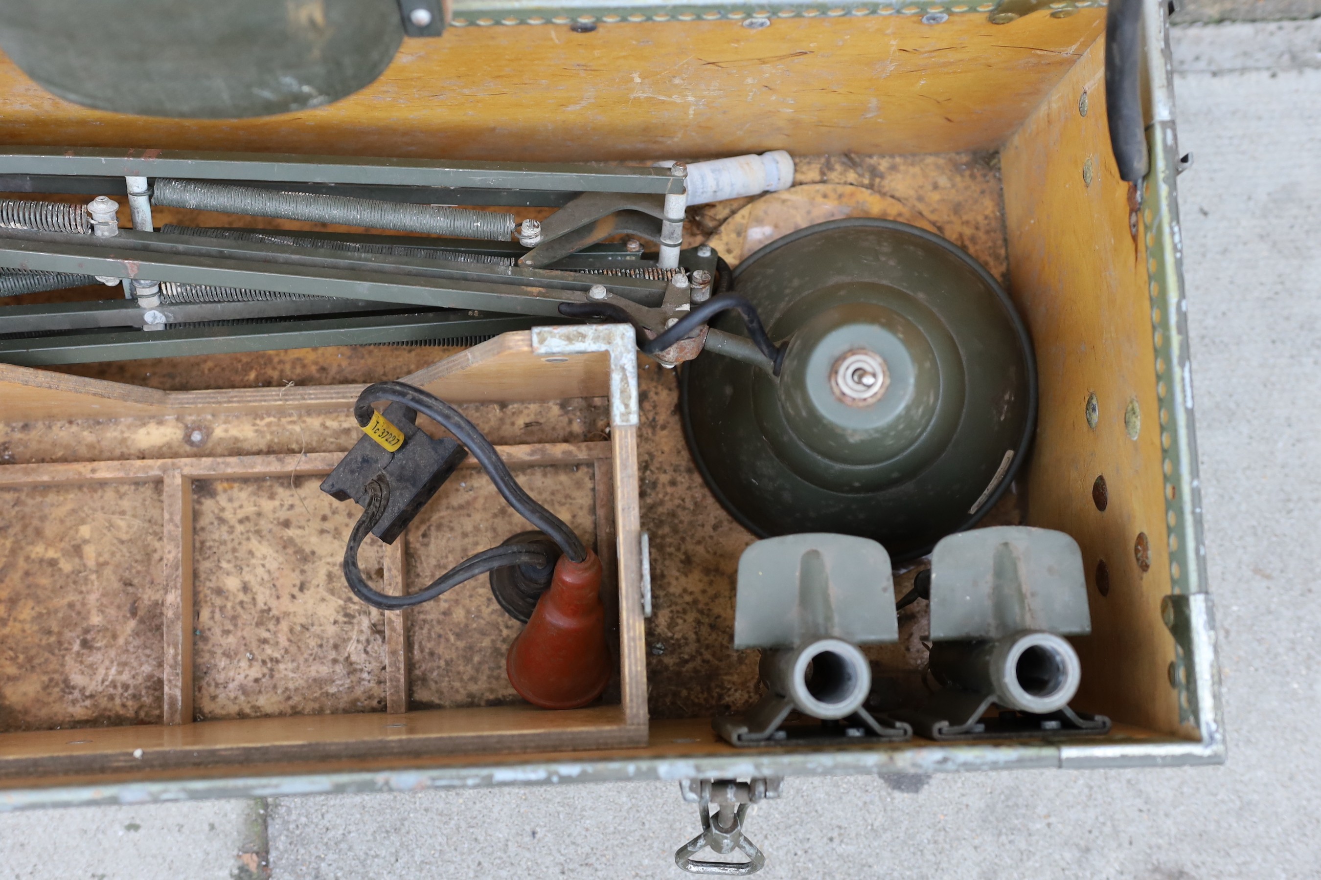 A pair of Swedish Army Carlson Varberg anglepoise lamps with accessories and original instructions dated 1963, in original trunk marked ‘Faltbordslampa 5’, height of lamp to bend 65cm. width of case 83cm